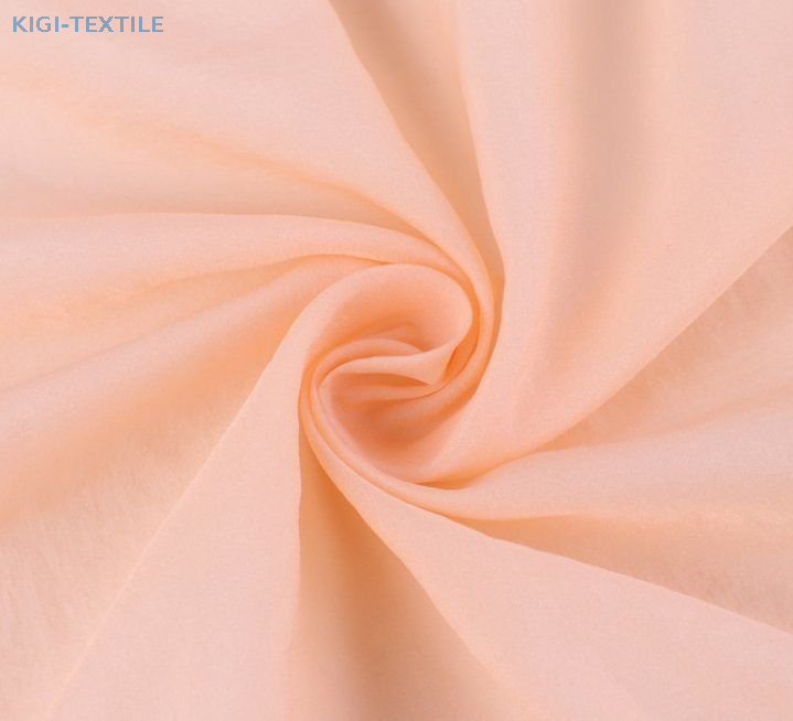 Water and oil repellent fabric surface