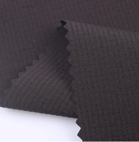 70D+40D N66 ripstop four-way mechanical stretch fabric black flat swatch 70D+40D N66 ripstop mechanical stretch fabric weave close-up khaki 70D+40D N66 ripstop four-way stretch fabric draped angle view khaki